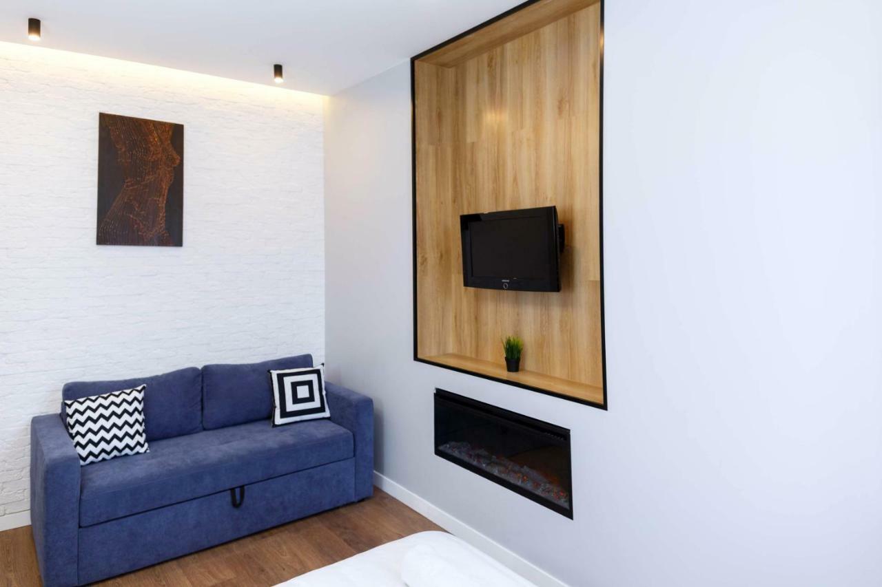 Loft Apartment In Old Lviv Ac Fireplace Exterior photo
